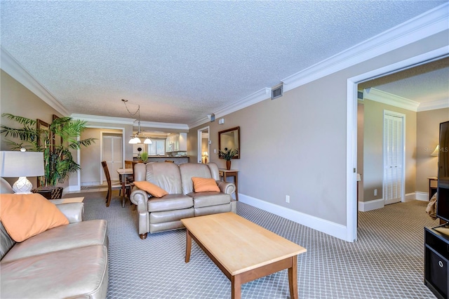 living room with ornamental molding, carpet flooring, and a textured ceiling