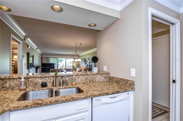 kitchen with sink, crown molding, white cabinetry, and white dishwasher