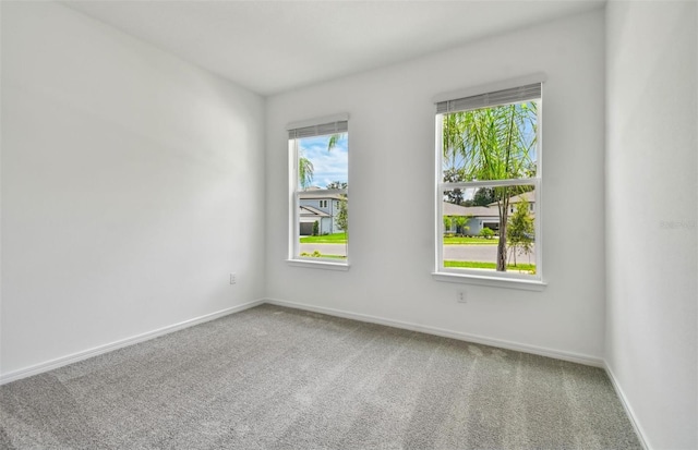 view of carpeted spare room