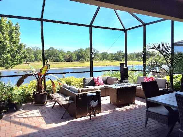 sunroom with a water view