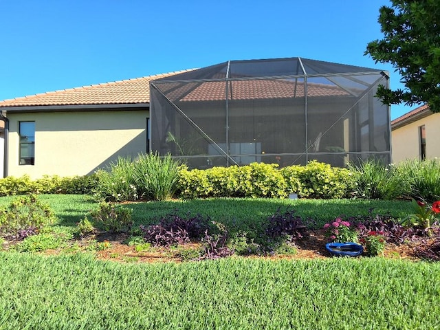 exterior space featuring glass enclosure