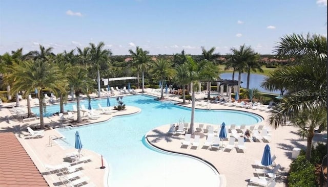 view of swimming pool with a patio area