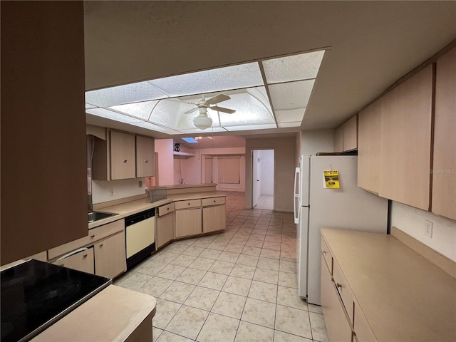 kitchen with ceiling fan, a paneled ceiling, light tile floors, sink, and white appliances