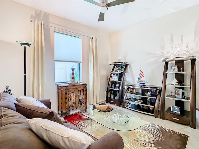 living room featuring ceiling fan and tile floors