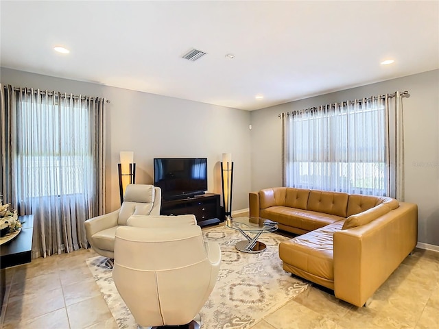 living room with light tile floors