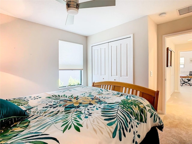 bedroom featuring a closet, carpet floors, and ceiling fan