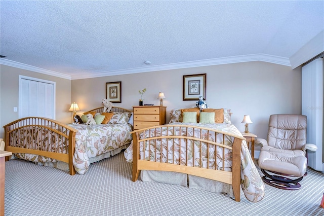 bedroom featuring crown molding, carpet floors, and a textured ceiling