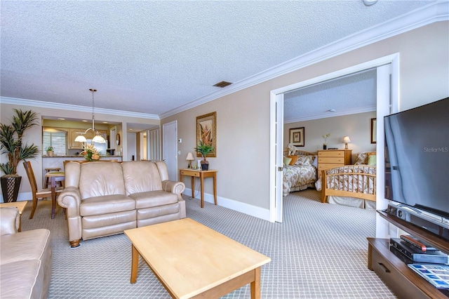 carpeted living room featuring ornamental molding, a chandelier, and a textured ceiling