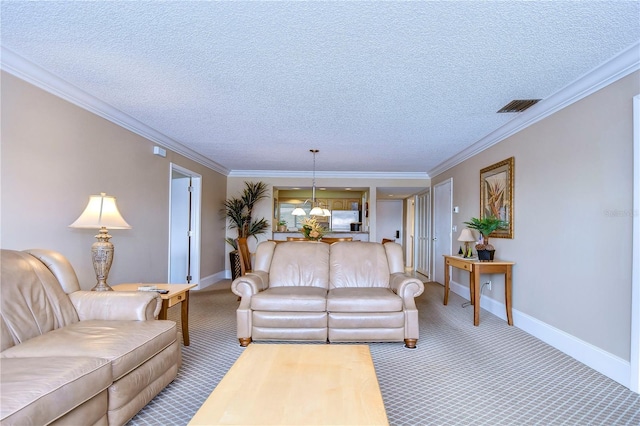 carpeted living room with a textured ceiling and crown molding