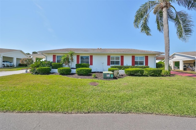 single story home with a front lawn and stucco siding