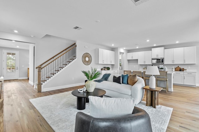 living room with light wood-type flooring