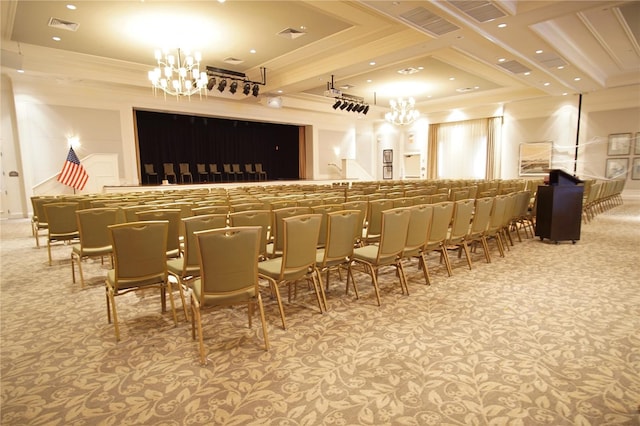 carpeted cinema room featuring ornamental molding and a chandelier