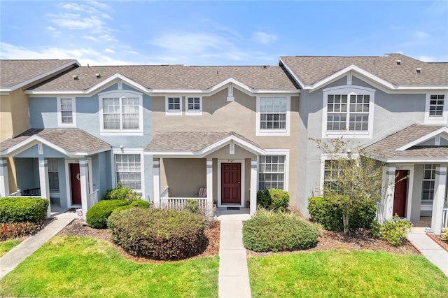 view of front of property with a front lawn