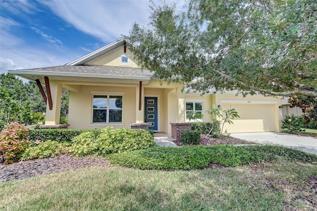 view of front of house with a porch and a garage