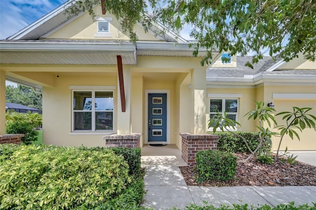 doorway to property with a porch