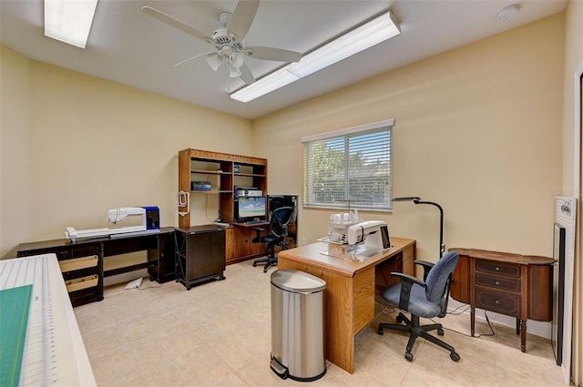 tiled office space with ceiling fan