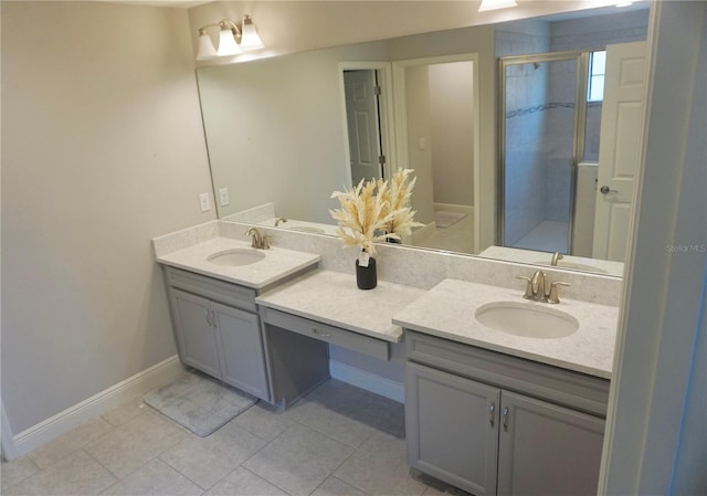 bathroom with tile flooring, oversized vanity, and double sink