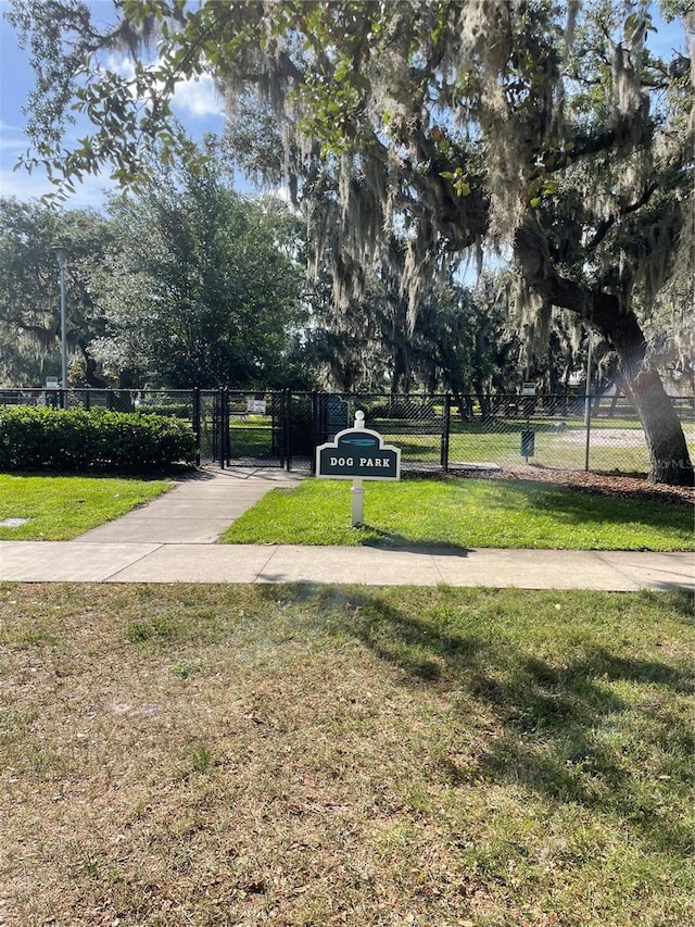 view of home's community featuring a yard