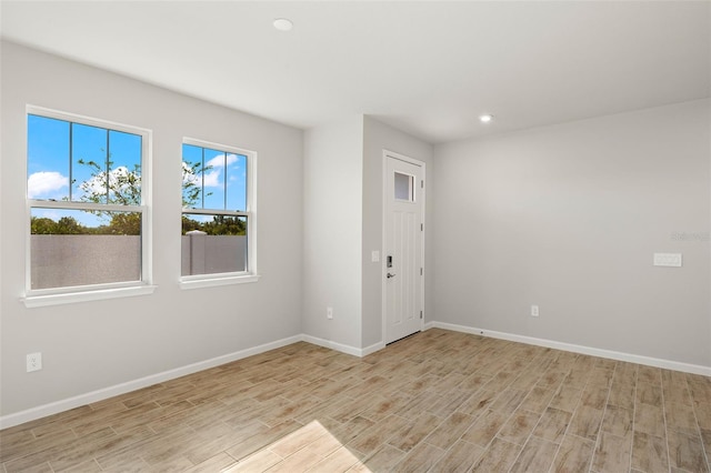 empty room featuring light hardwood / wood-style floors