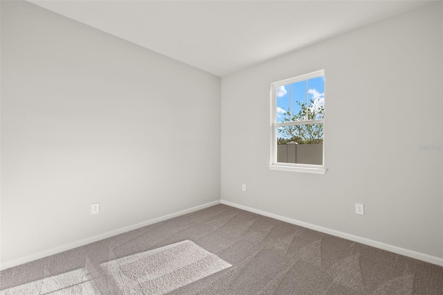 view of carpeted spare room