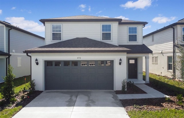 view of front of home with a garage