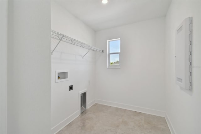 laundry area featuring hookup for an electric dryer, electric panel, and hookup for a washing machine