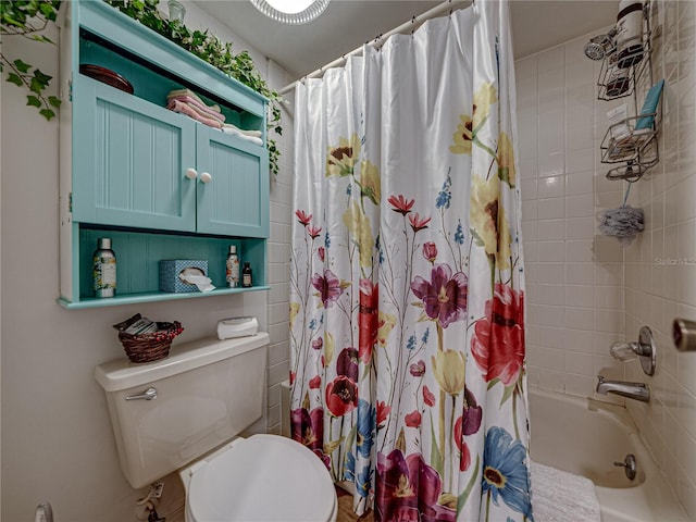 bathroom with toilet and shower / bath combo