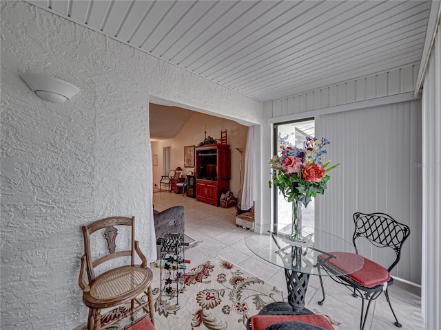 sitting room with light tile patterned flooring