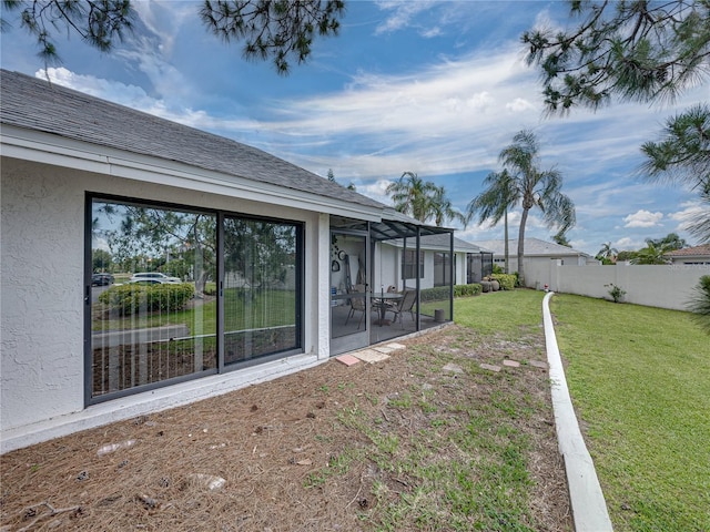 view of yard with a lanai