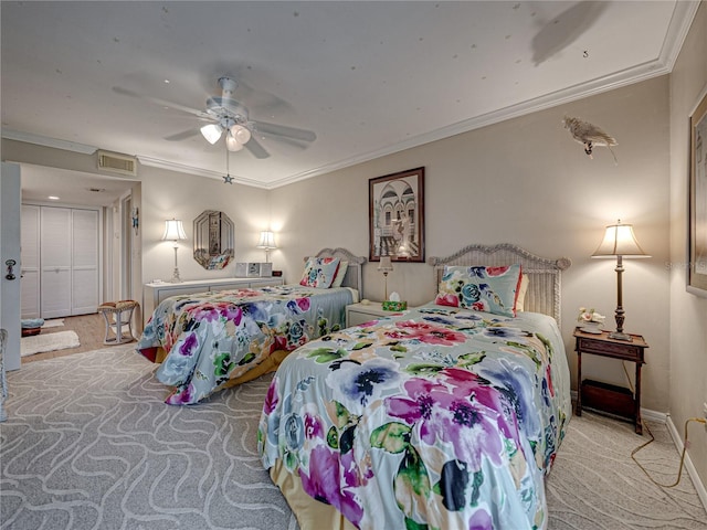 bedroom featuring crown molding, ceiling fan, and light carpet