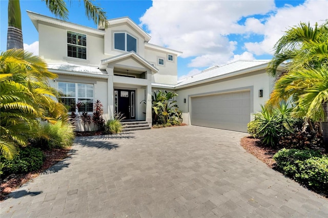 view of front of property with a garage