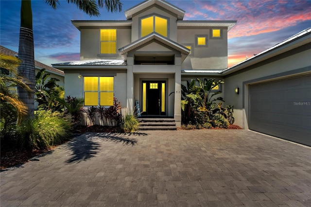 view of front of property featuring a garage