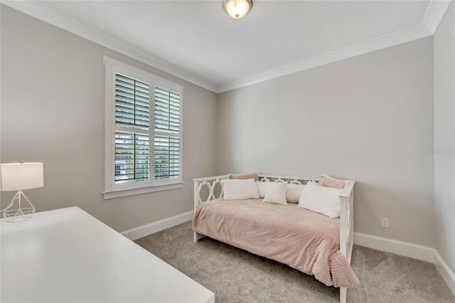 bedroom featuring crown molding and carpet floors