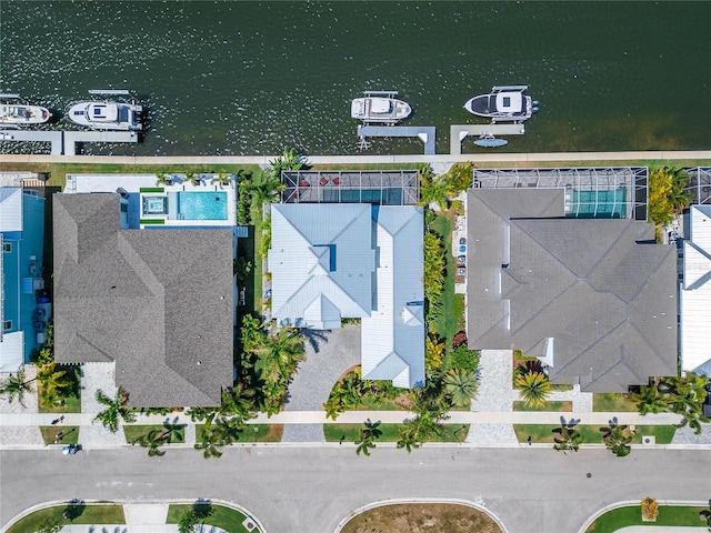 birds eye view of property featuring a water view