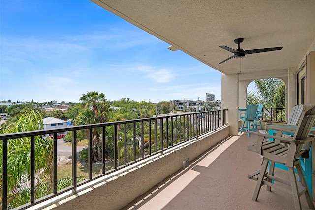 balcony featuring ceiling fan