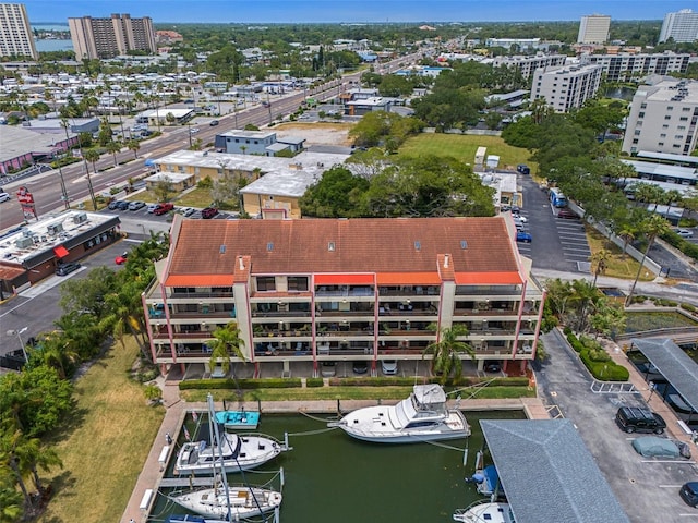 birds eye view of property featuring a water view