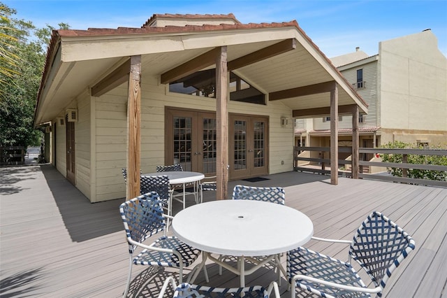 wooden deck featuring french doors