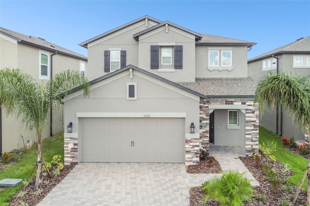 front facade with a garage