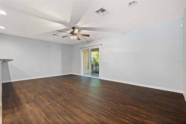 unfurnished room featuring ceiling fan and hardwood / wood-style floors