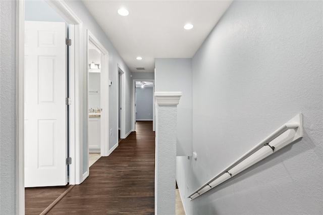 hallway featuring dark wood-type flooring