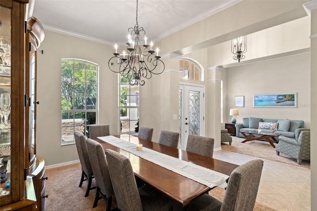 tiled dining area with a notable chandelier and crown molding