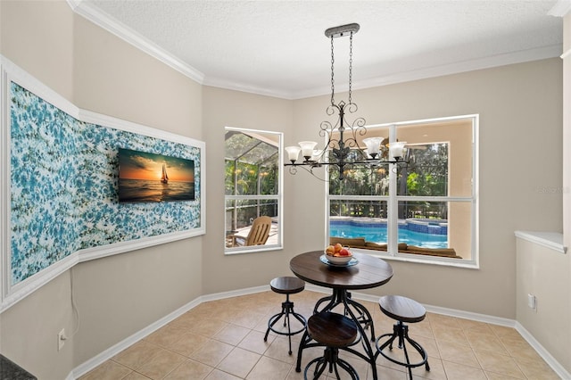 dining area with ornamental molding, a notable chandelier, and light tile floors