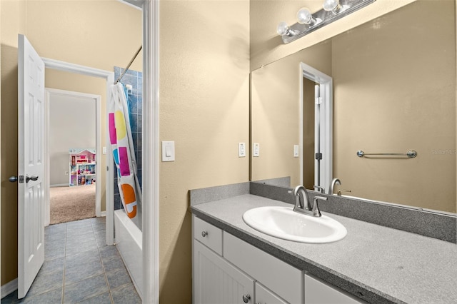 bathroom with tile flooring, vanity, and shower / bath combo