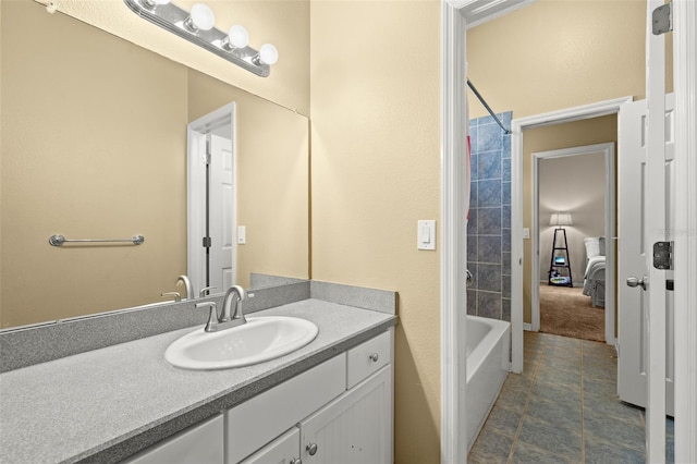 bathroom with vanity, shower / washtub combination, and tile flooring