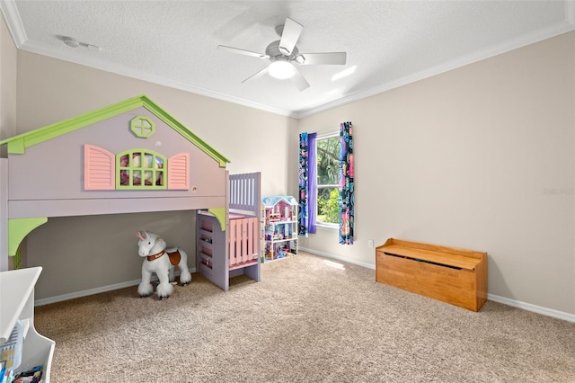 bedroom featuring a textured ceiling, ceiling fan, carpet, and ornamental molding