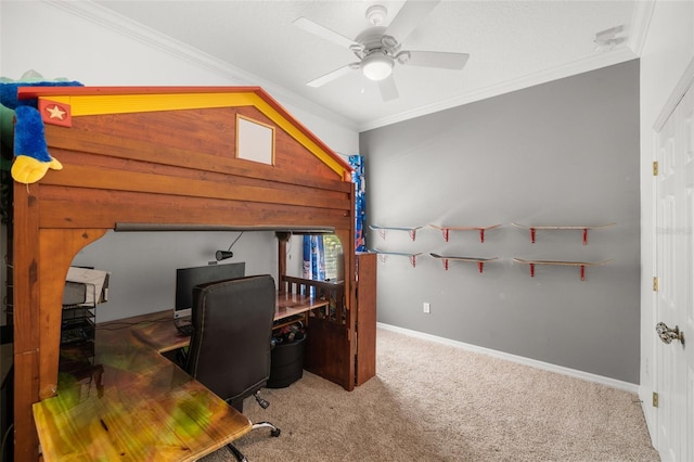 home office with carpet floors, ceiling fan, and ornamental molding