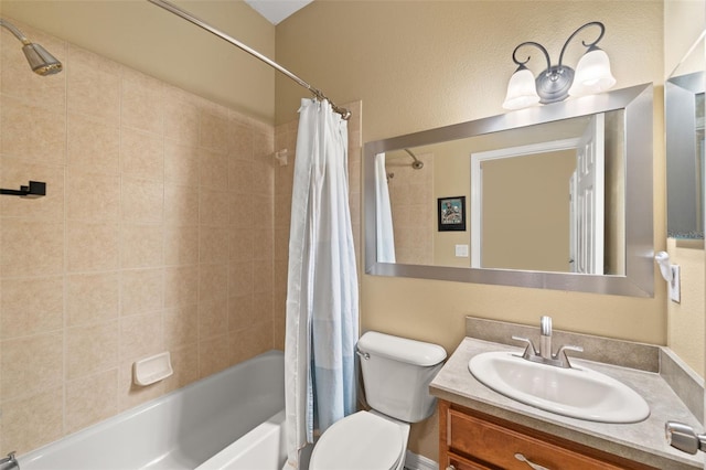 full bathroom featuring shower / bath combination with curtain, vanity, and toilet