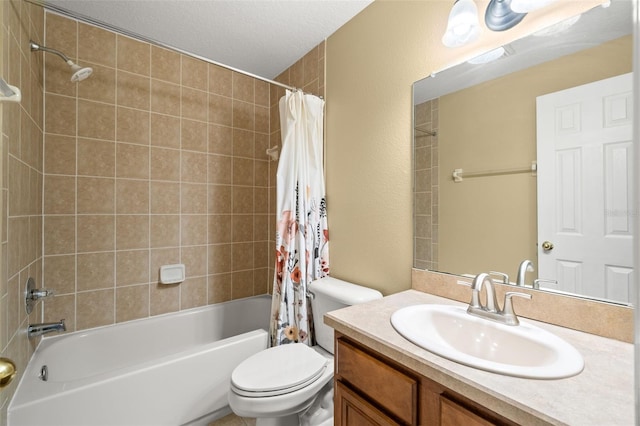 full bathroom with shower / tub combo with curtain, vanity with extensive cabinet space, toilet, and a textured ceiling