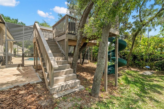 exterior space featuring a swimming pool side deck and a patio