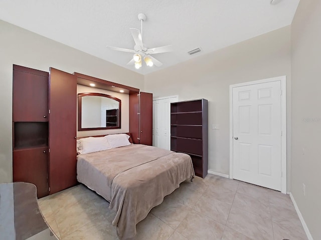 bedroom featuring ceiling fan and a closet